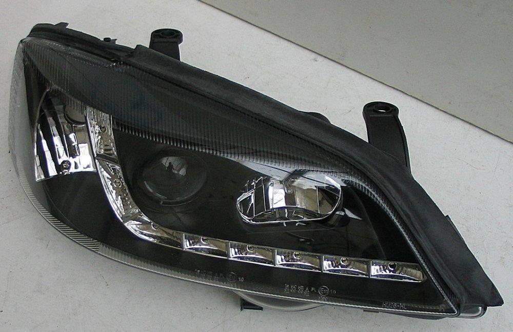 Opel Astra G оптика передня чорна LED (HU287E-00-1-E-01), фото 1