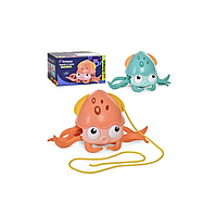 Дитяча заводна іграшка "Восьминіг QC23Y" плаває і ходить 2+.