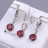 Набір ХР. Кулон та сережки. Родій. Камені: бордовий циркон. Довжина сережки: 24 мм. Довжина кулона: 14 мм.