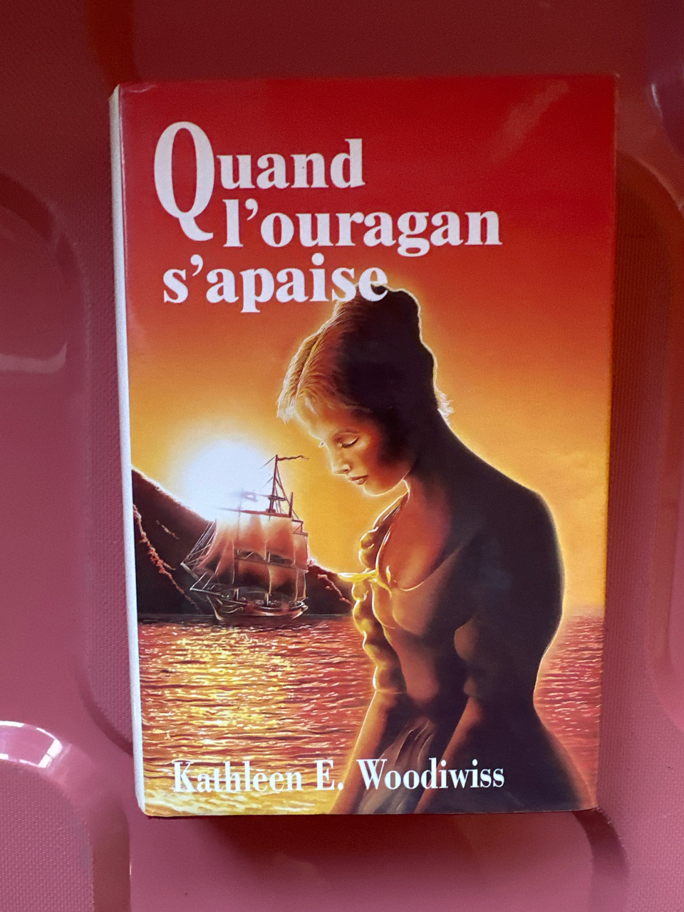 Quand l'ouragan s'apaise Kathleen E. Woodiwiss (книга французькою)