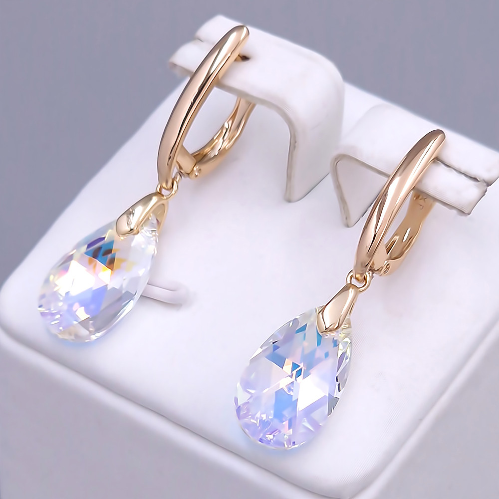 Сережки XР. Позолота 18К. Камені: Swarovski. Довжина: 38 мм. Ширина: 10 мм.