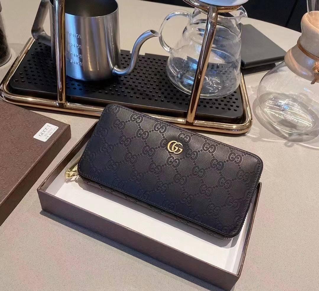 Чоловічий чорний клатч Gucci