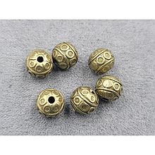 Намистини металеві 7,7мм (18 шт), колір бронза