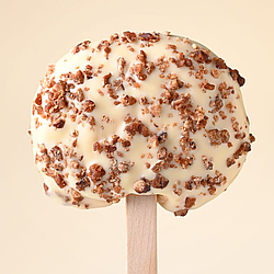 Яблуко в білому шоколаді з пеканом