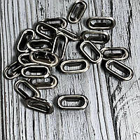 Люверс овальний 15 мм Темний нікель (у пакованні 1000 штук)