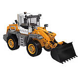 Конструктор Будівельна техніка Трактор із ковшем на 694 деталі, фото 3