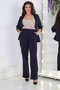 Жіночий діловий синій костюм з прямих штанів і піджака