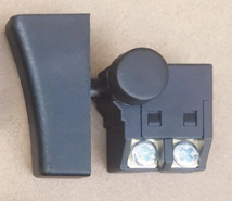 Кнопка для акумуляторної пили