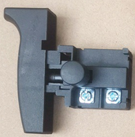 Кнопка для акумуляторної пили