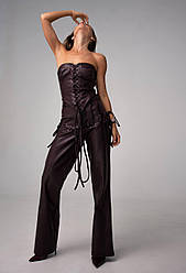 Ефектні жіночі штани Bravo з екошкіри декоровані шнурівкою Bf476