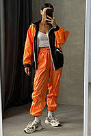 Вітрівка жіноча помаранчевого кольору 184242L