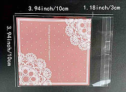 Пакет поліетиленовий з липкою стрічкою з мережкою, 10 х 10см, Колір -  рожевий (шт)