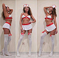 Білі панчохи з червоним бантиком