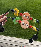 Дуга з іграшками на шезлонг