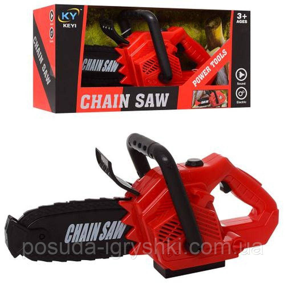 Пила KY1068-109 рухомі деталі, музика, на батарейках, в коробці, 33-16,5-12,5 см., фото 1