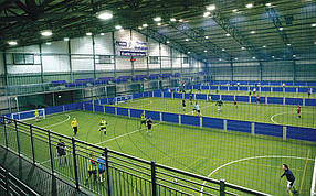 Укладання штучної трави для футбольних полів, тенісних кортів, дитячих майданчиків та зон відпочинку