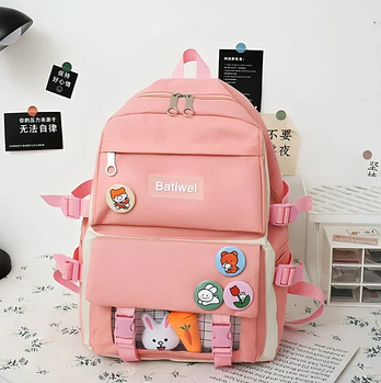 Рюкзак шкільний для дівчинки має багато зовнішніх кишень на блискавці рожевий