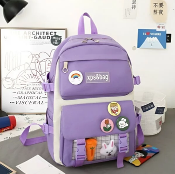 Рюкзак шкільний для дівчинки має багато зовнішніх кишень на блискавці фіолетовий