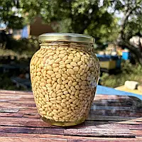 Кедрові горіхи в меду акації 0,72 л ( 850 грамів)