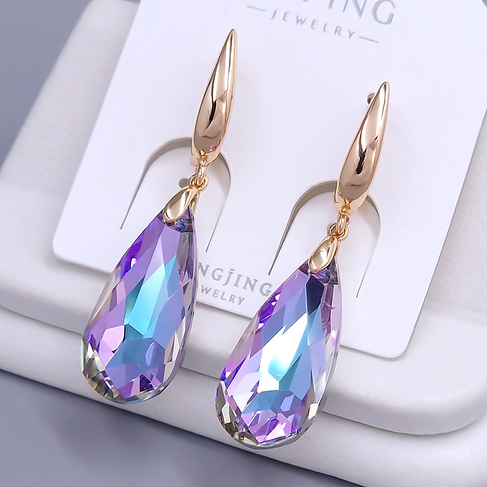 Сережки XР. Позолота 18К. Камені: Swarovski блакитний хамелеон. Довжина: 45 мм. Ширина: 12 мм