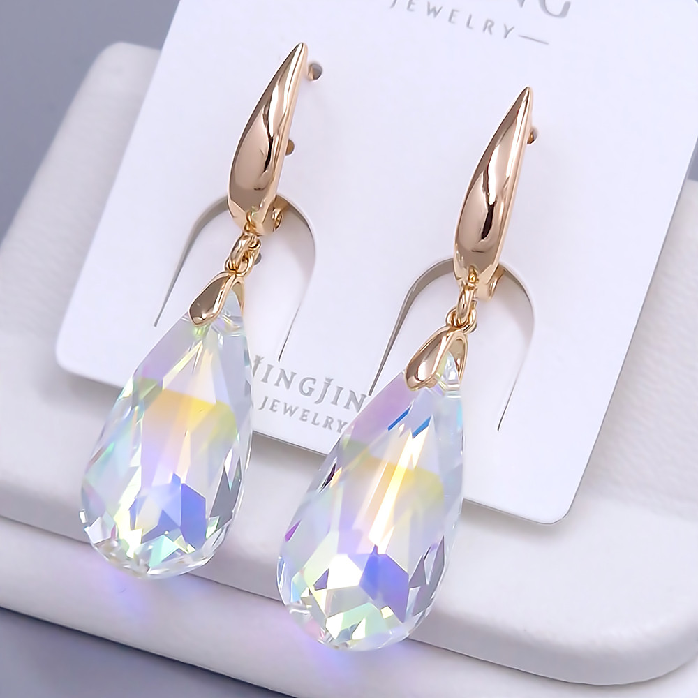 Сережки XР. Позолота 18К. Камені: Swarovski бензинового кольору. Довжина: 45 мм. Ширина: 12 мм
