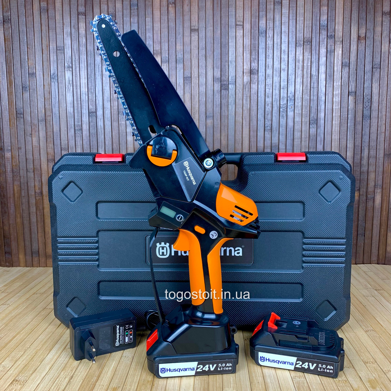 Акумуляторна мініпила Husqvarna 75iXP KIT (24V, 5 Аh), з індикатором заряду та оливним бачком