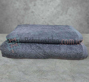 Комплект сірих рушників для готелів