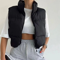 Жилетки, кардигани