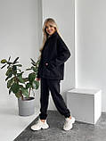 Чорний теплий жіночий костюм з об'ємним худі з тринитки на флісі, фото 6