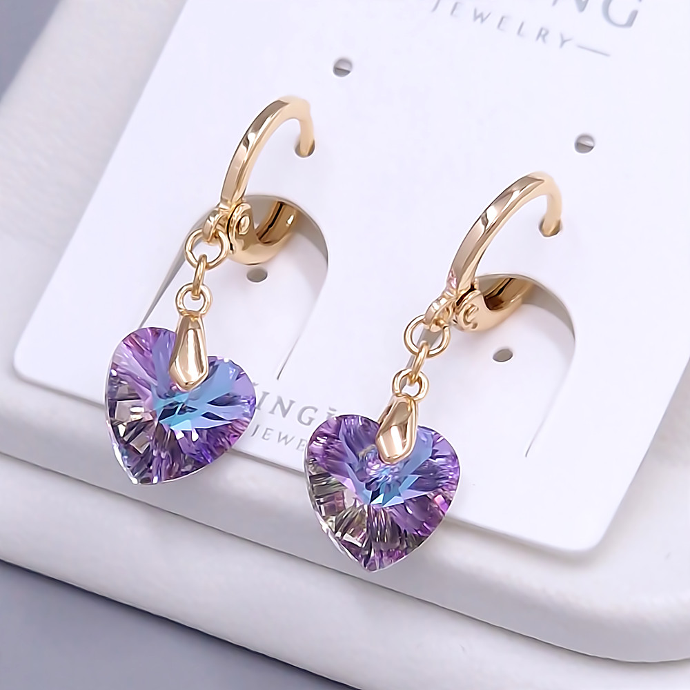 Сережки XР. Позолота 18К. Камені: Swarovski ніжно-фіолетовий хамелеон. Довжина: 22 мм. Ширина: 9 мм.