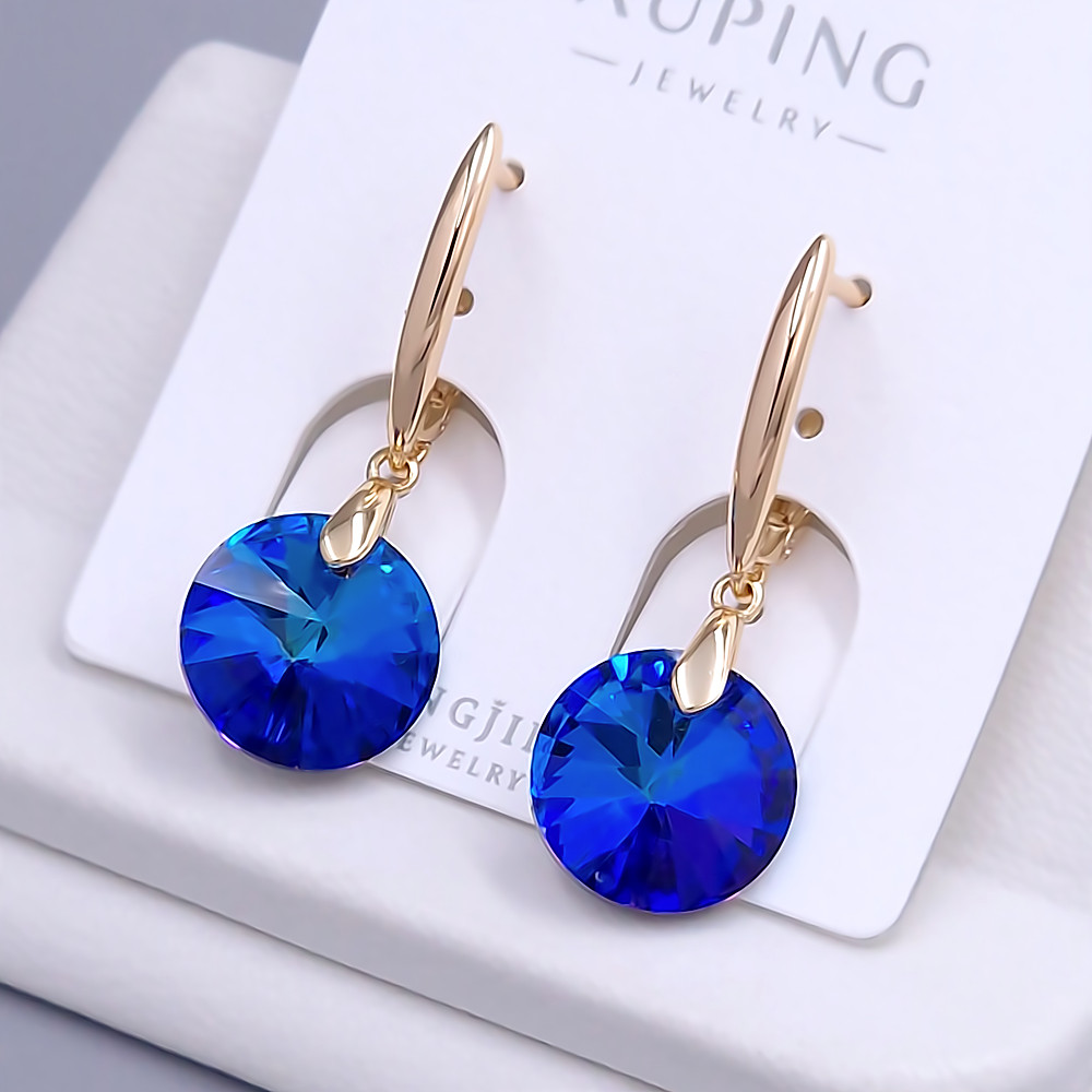 Сережки XР. Позолота 18К. Камені: Swarovski синій хамелеон. Довжина: 33 мм. Ширина: 12 мм.