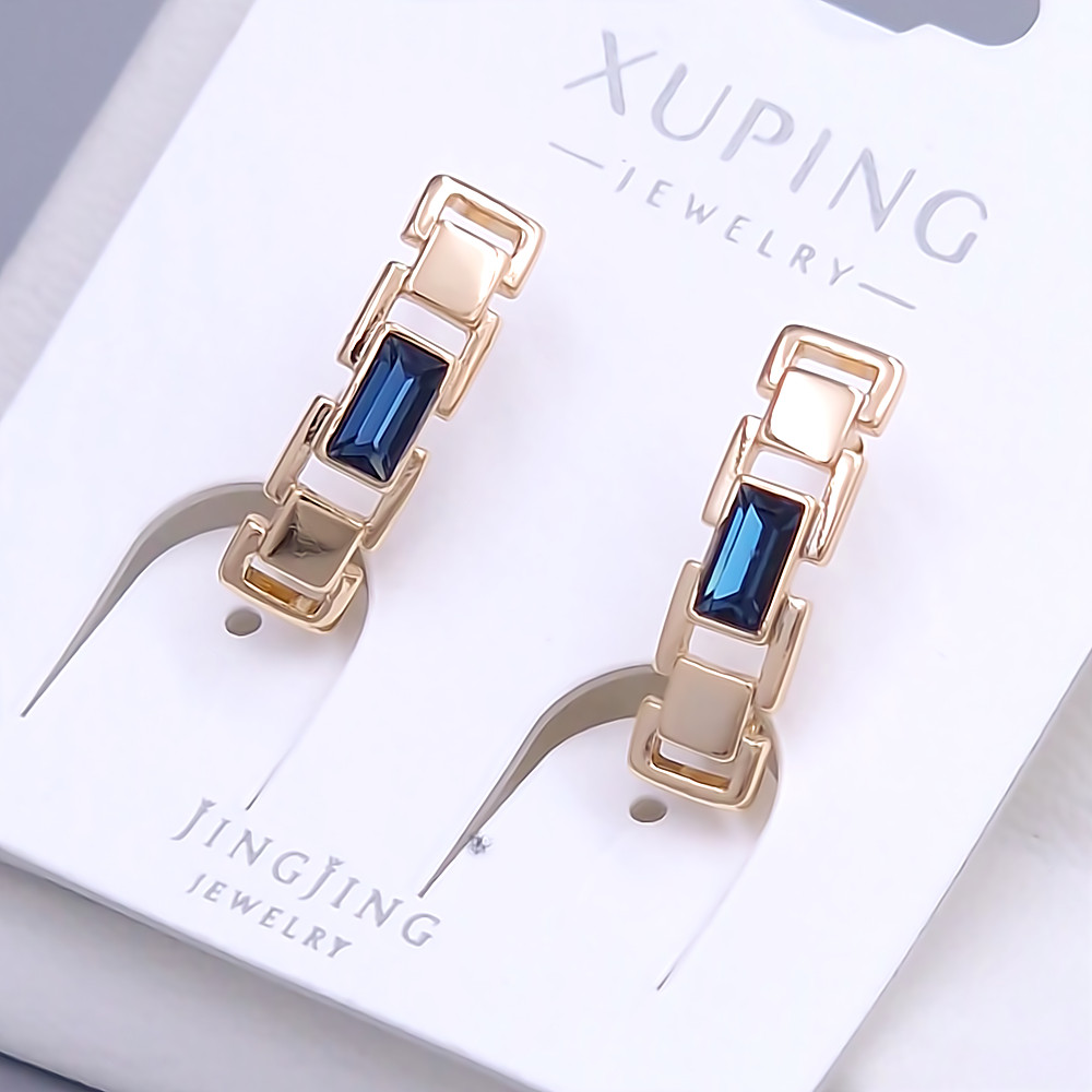 Сережки XР. Позолота 18К. Камені: Swarovski темно-синього кольору. Довжина: 18 мм. Ширина: 5 мм.