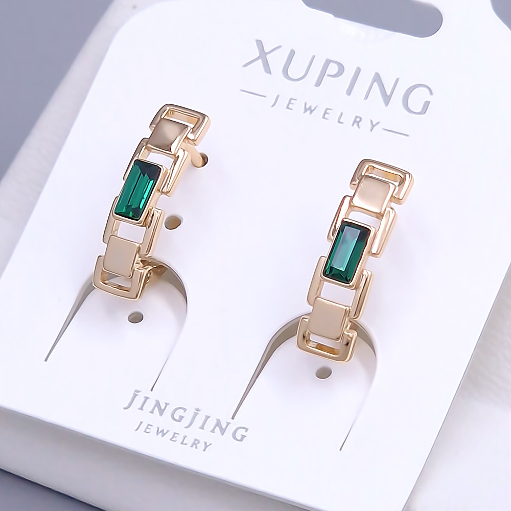 Сережки XР. Позолота 18К. Камені: Swarovski темно-зеленого кольору. Довжина: 18 мм. Ширина: 5 мм.