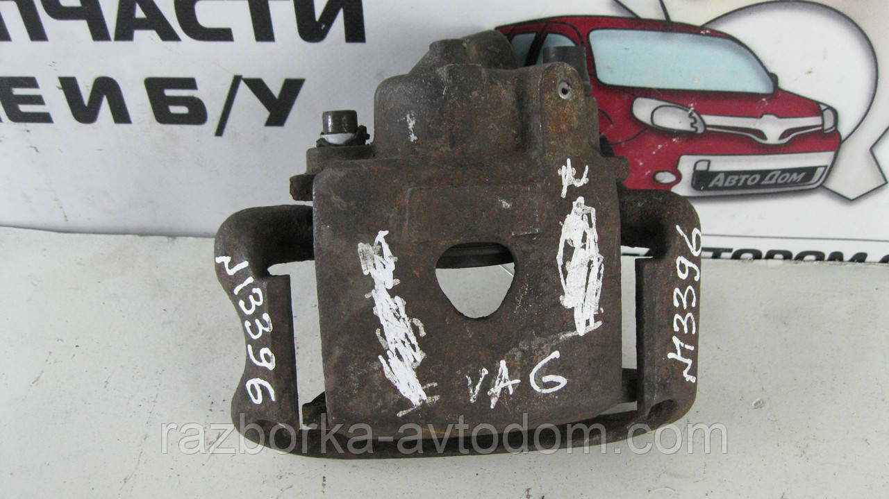Скоба супорту переднього лівого VW Passat B3, Seat Cordoba, Golf 3 OE:171615123B