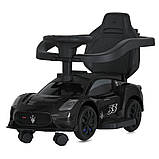 Дитяча каталка-толокар Maserati 5106 з батьківською ручкою 2 в 1 Чорний, фото 6