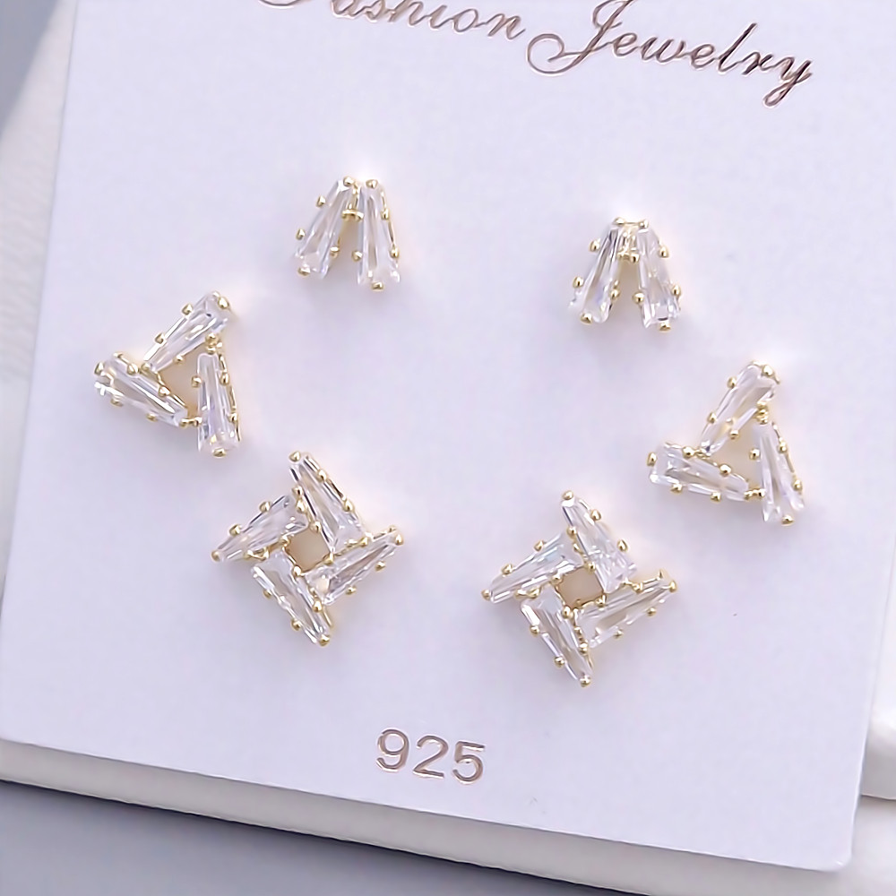 Набір із 3-х пар сережок-гвоздиків FJ. Позолота лимонного відтінку. Камені: циркон