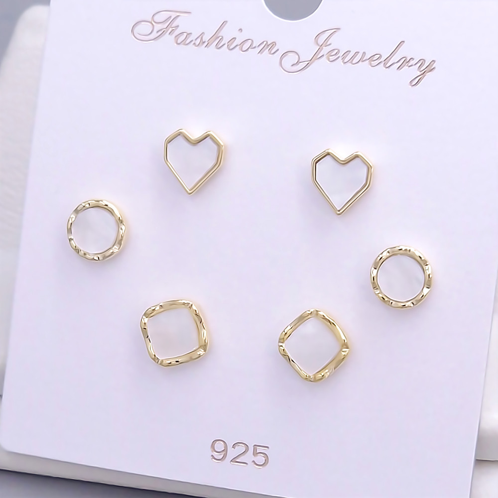 Набір із 3-х пар сережок-гвоздиків FJ. Позолота лимонного відтінку.