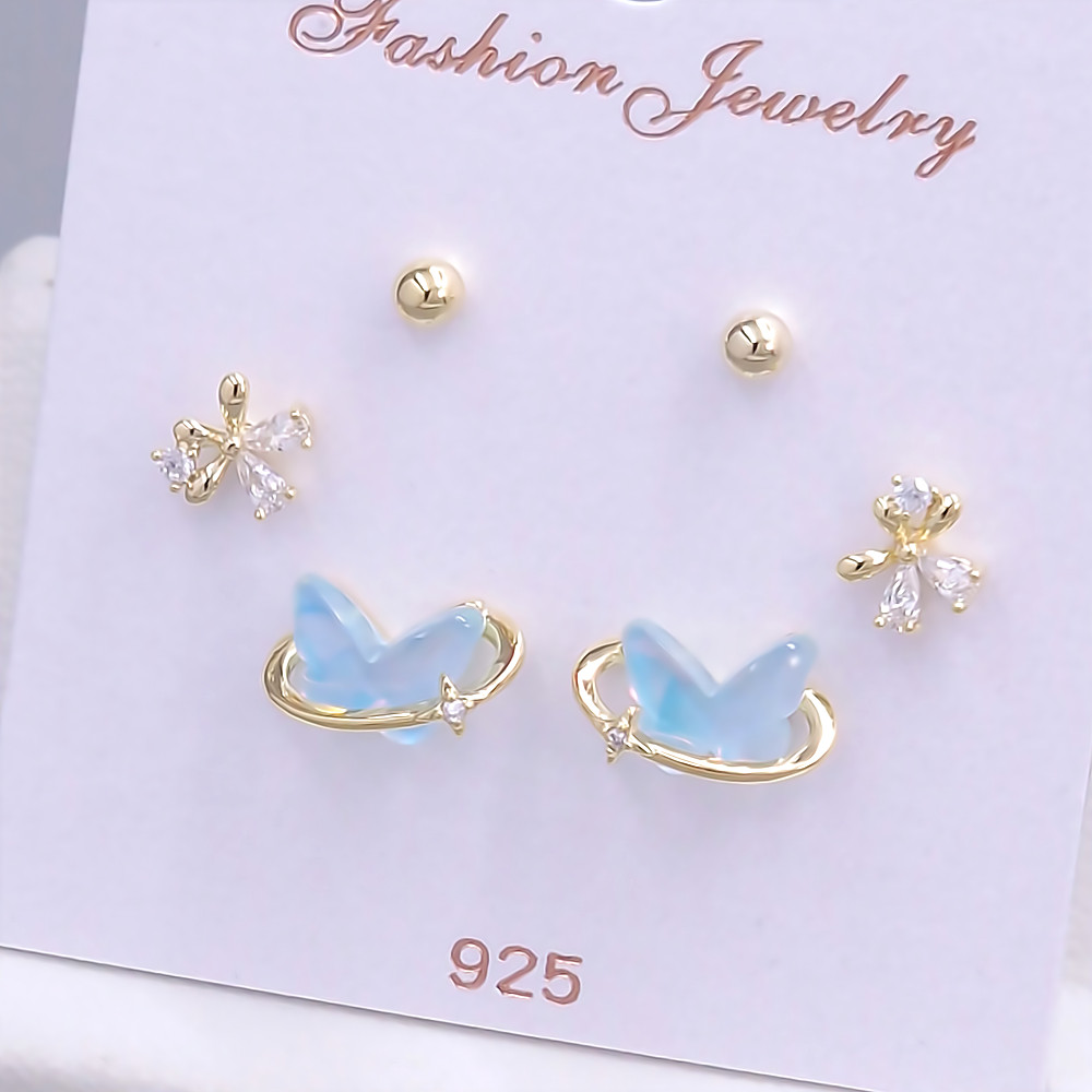 Набір із 3-х пар сережок-гвоздиків FJ. Позолота лимонного відтінку. Камені: циркон