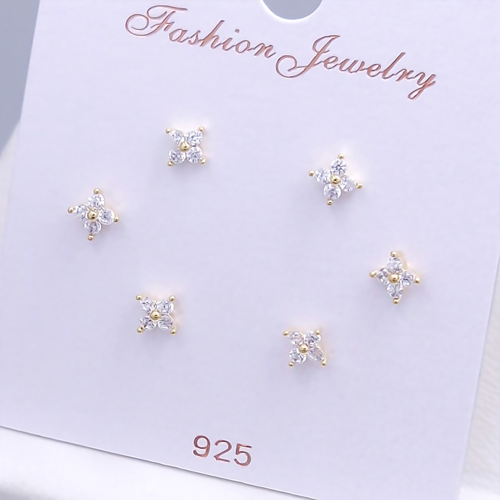 Набір із 3-х пар сережок-гвоздиків FJ. Позолота лимонного відтінку. Камені: циркон