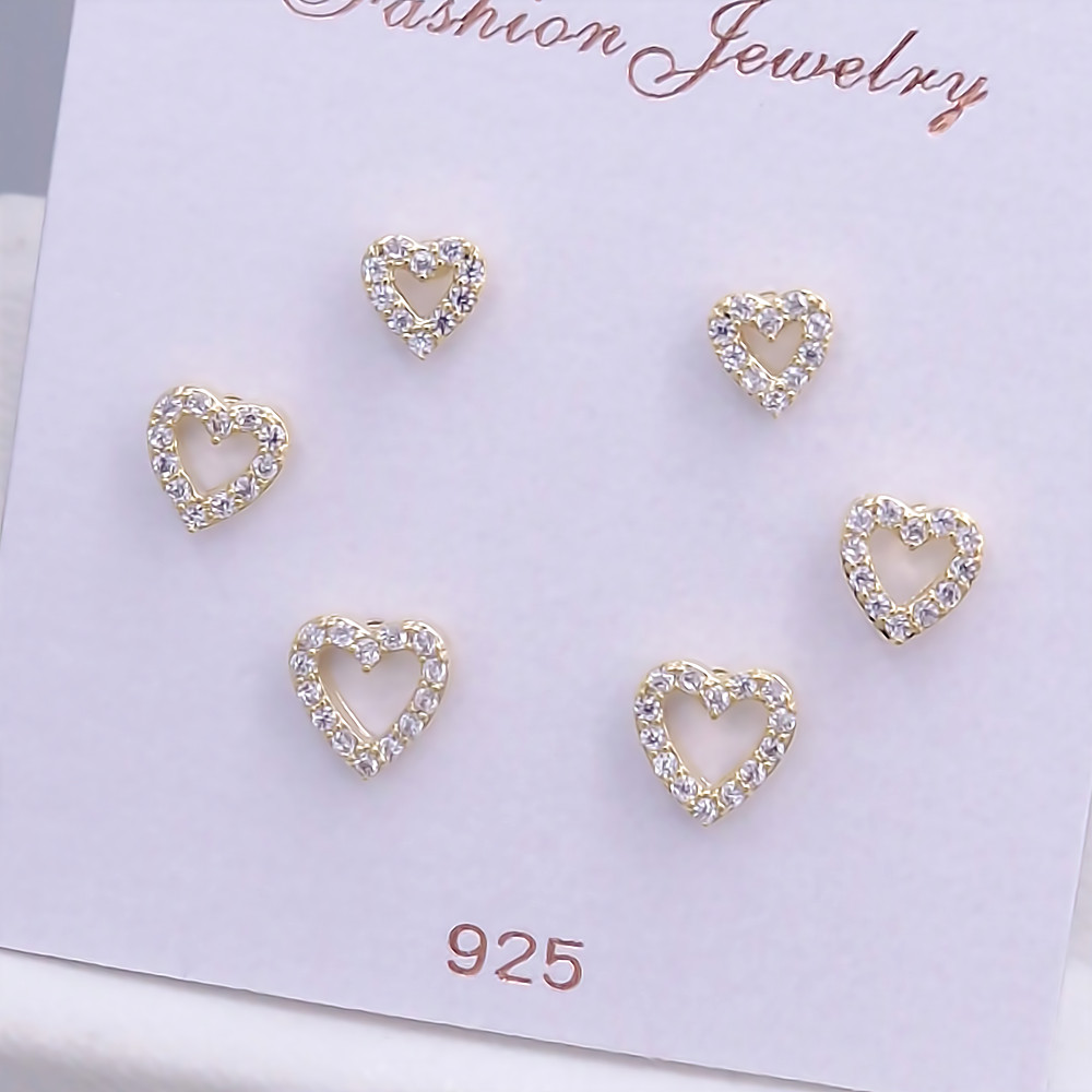 Набір із 3-х пар сережок-гвоздиків FJ. Позолота лимонного відтінку. Камені: циркон