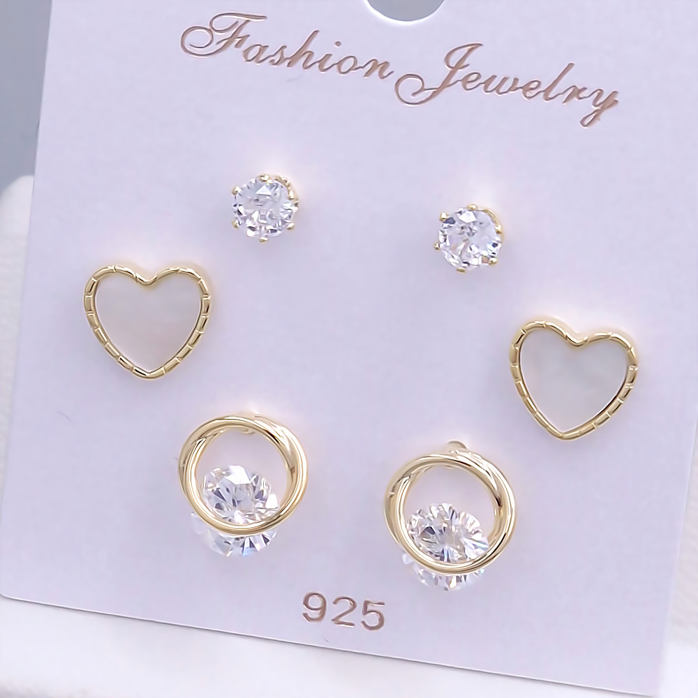 Набір із 3-х пар сережок-гвоздиків FJ. Позолота лимонного відтінку. Камені: циркон