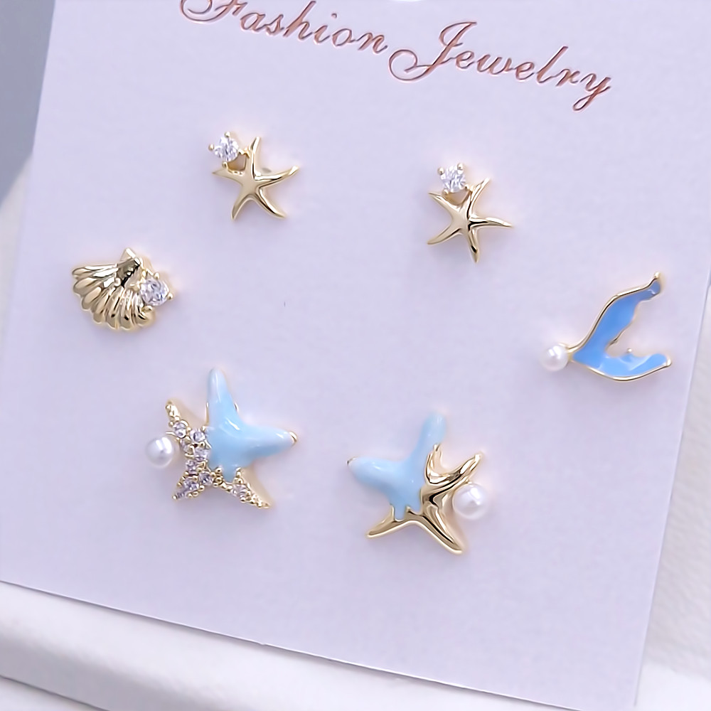 Набір із 3-х пар сережок-гвоздиків FJ. Позолота лимонного відтінку. Камені: циркон та перли