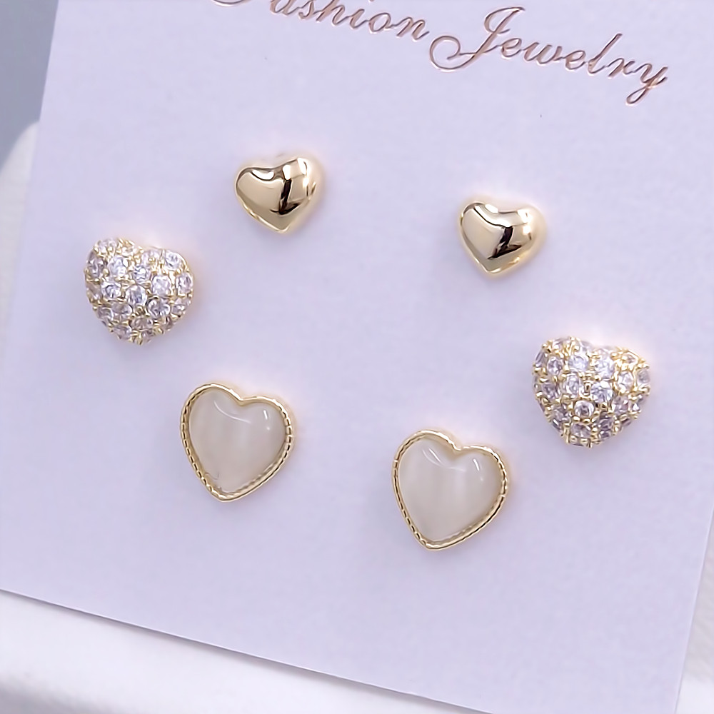 Набір із 3-х пар сережок-гвоздиків FJ. Позолота лимонного відтінку. Камені: циркон