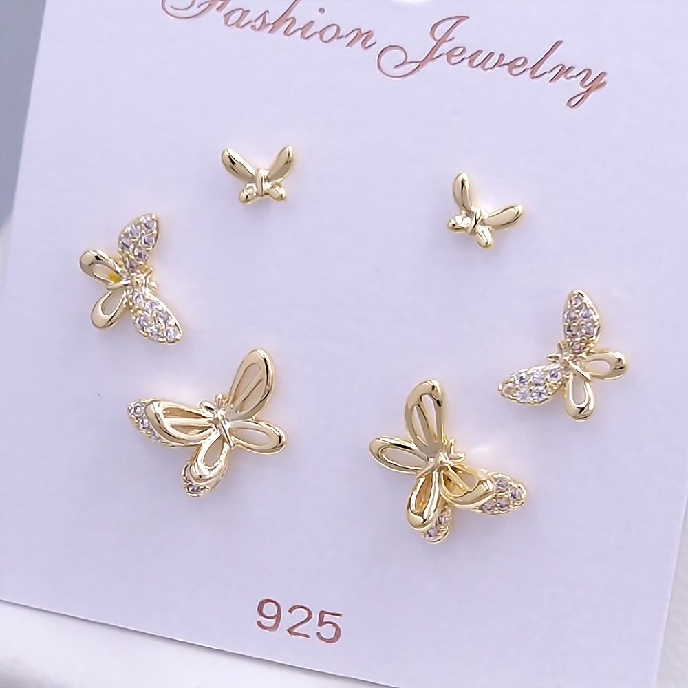 Набір із 3-х пар сережок-гвоздиків FJ. Позолота лимонного відтінку. Камені: циркон