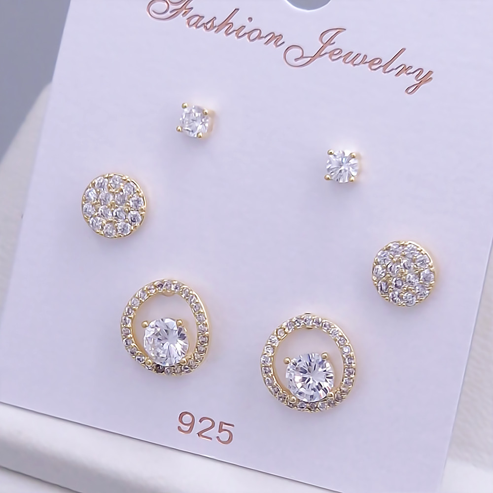 Набір із 3-х пар сережок-гвоздиків FJ. Позолота лимонного відтінку. Камені: циркон