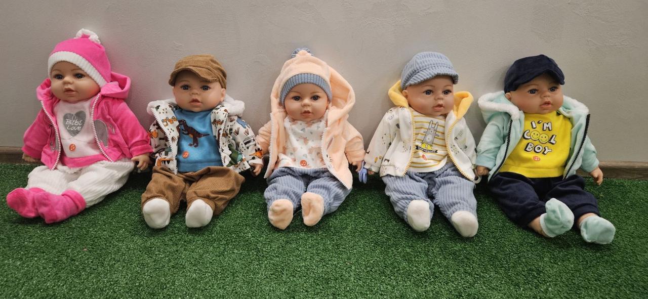 Пупс м'який у зимовій куртці 44 см зі звуками та музикою українською