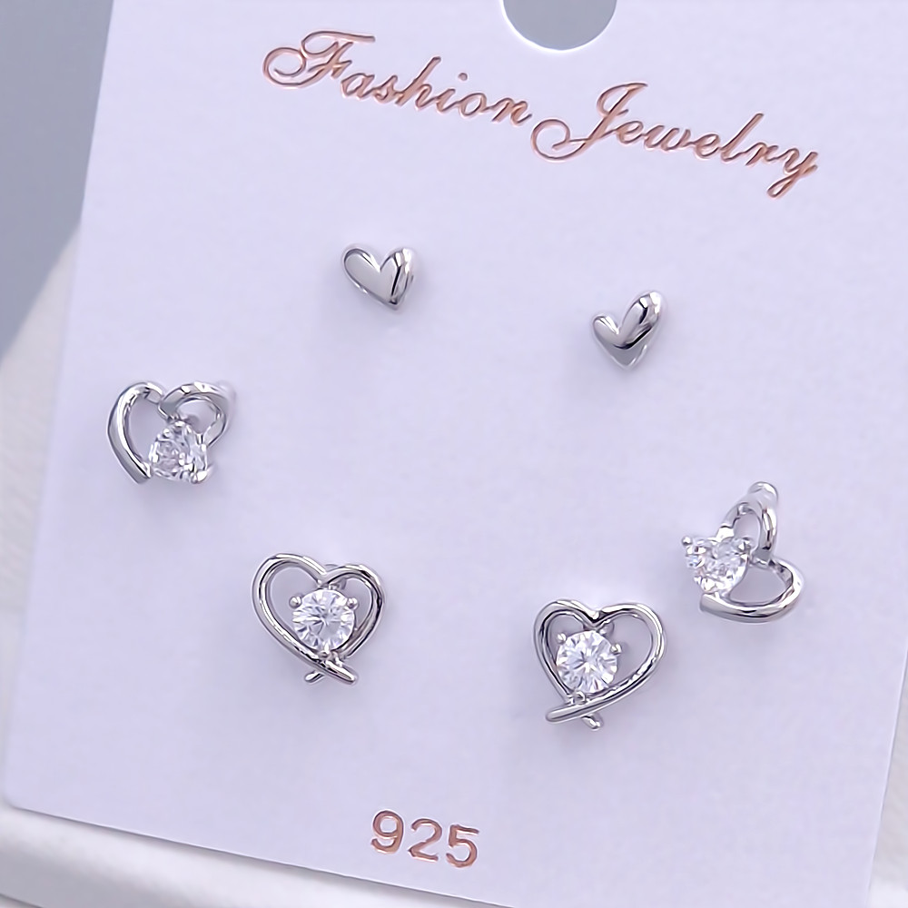 Набір із 3-х пар сережок-гвоздиків FJ. Родій. Камені: білий циркон