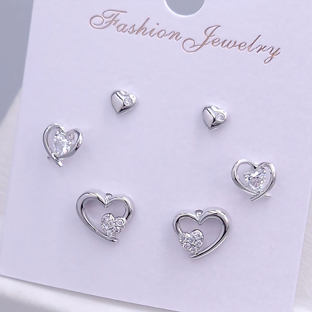 Набір із 3-х пар сережок-гвоздиків FJ. Родій. Камені: білий циркон