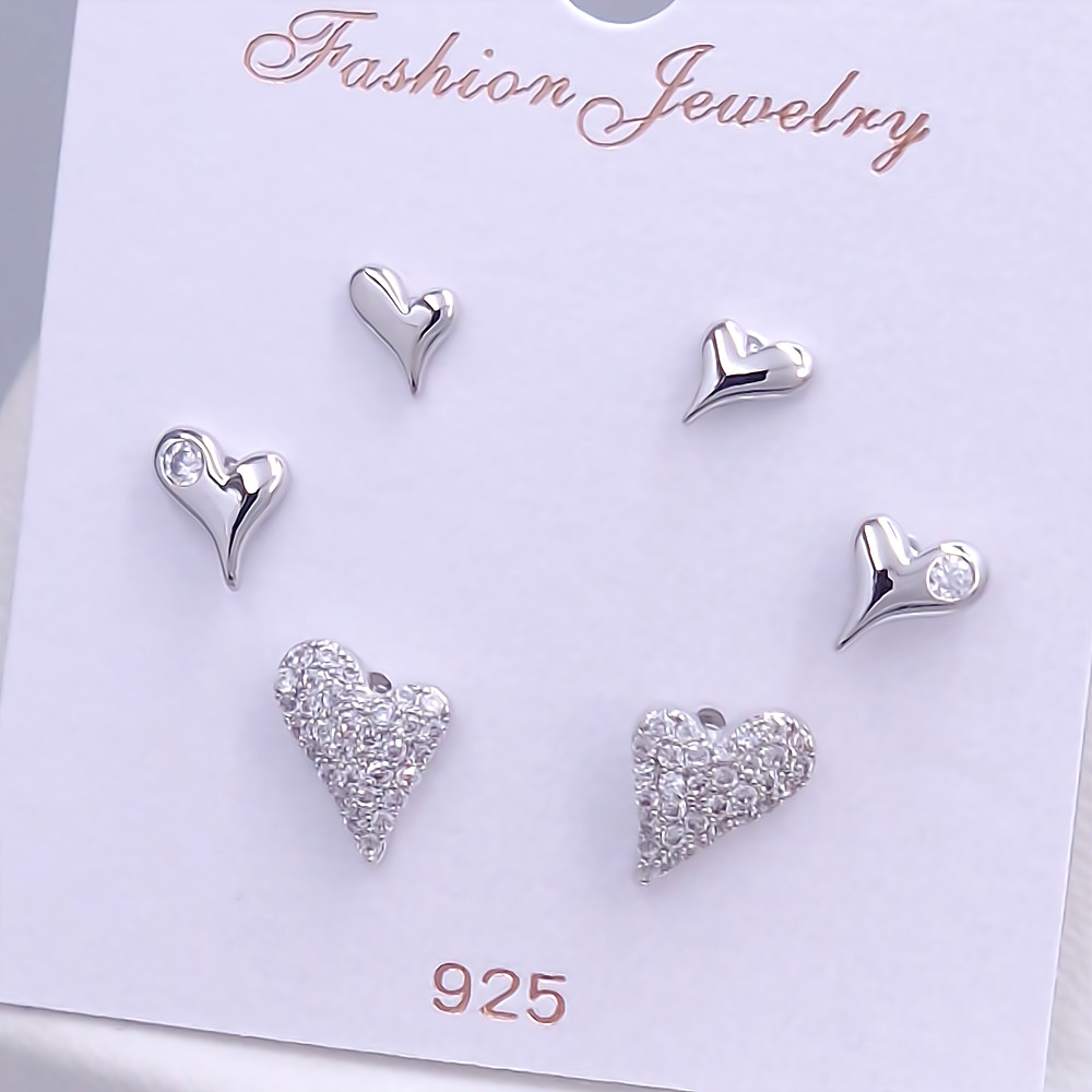 Набір із 3-х пар сережок-гвоздиків FJ. Родій. Камені: білий циркон