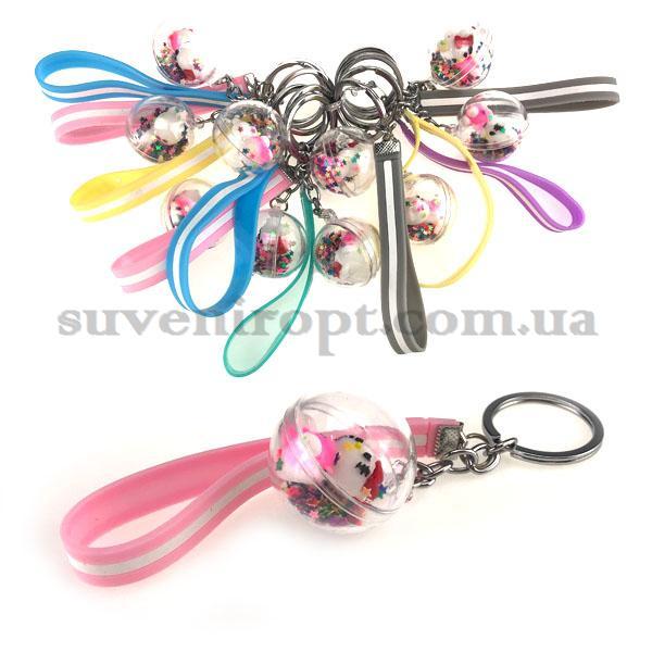 Оригінальний різнобарвний брелок іграшка в кульці з браслетом, фото 1